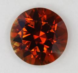 Nice 2 carat standard round brilliant with sharp orange color.