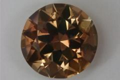 Clean, golden cream with pink highlights, round