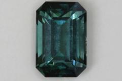Blue/green emerald cut with closed ends.