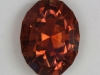 A Dravite Brown Orange Oval.