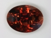 Deep, extremely dichroic cream/mahogany oval.
