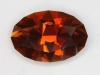 Orange and golden brown dichroic oval