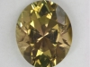 Paler brownish yellow oval that is dichrolc.
