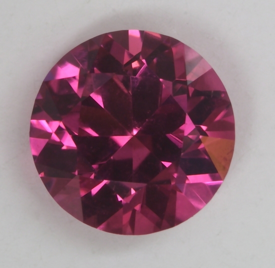 Nice eye, clean, medium pink round.  #14