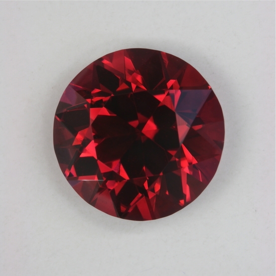 Nice medium, richer toned pink with an orange glow, round.  #39