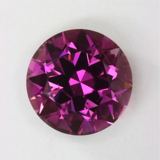 An exceptional medium tone purple with pinkish highlight, round, cuprian#42