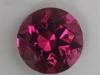 A bit darker than a medium tone, slightly included pink round.  #16