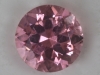 A baby, pastel pink that is eye clean round.  #20
