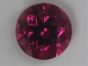 A medium toned, middle of the road rider of a pink, round.  #36