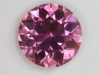 A nice eye clean middle of the road pink round.
