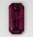 Included purplish red emerald cut. #464