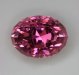 Pink orange color shifter oval with stepped crown.  #466