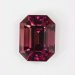 Fine dichroic purplish pink emerald cut. # 474