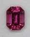 Moderately included fine bright pink emerald cut. #482