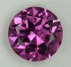 One faint feather and beautiful reddish purple colored round.  #487