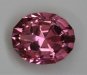 Medium hot pink with step cut crown, oval #498