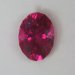 Moderate inclusion in a fireball of a hot pink oval.  #534