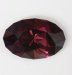 Dichoric, bronze and rich reddish purple, oval.  #546