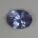 Visibly included purplish blue oval.  #554