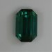 Nice darker blue green emerald cut with steep ends.  #556