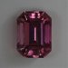 Medium toned, eye clean, pink emerald cut.  #561
