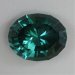 A high stepped crown and fine material makes a fine blue green oval .  #562