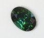 Smaller, dichroic, dark ended  green oval.  #570