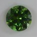 Bright slightly included grass green, oval  #575