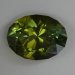 Dichroic with a high crown that has the darker green from the side, oval  #593