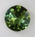 Large, bright green round, divided into pie shaped sections by dichoric colors.  #599