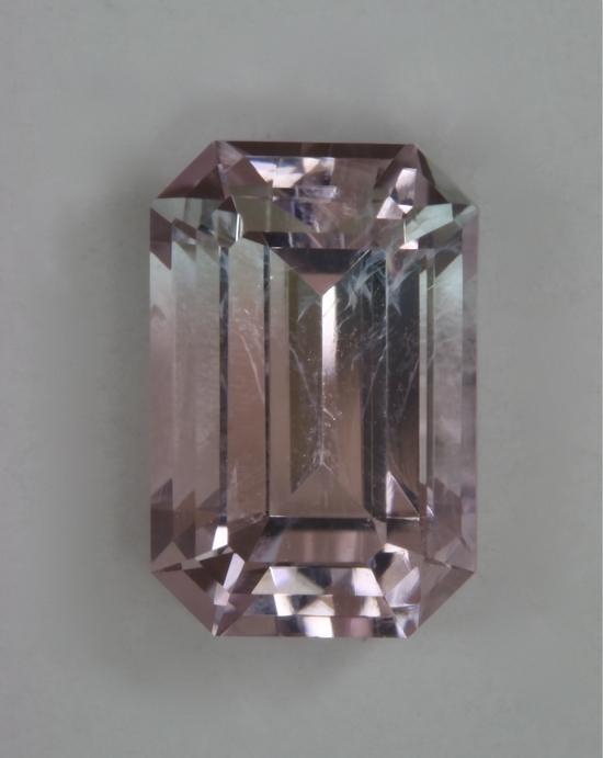 clean pale pink and blue emerald cut.  #681