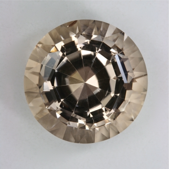 The larger ecru colored round is a GEM and I call her Queen Ecru.  #692