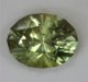 Clean, slighly brownish, yellow green oval.  #665