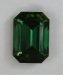 Dark ends on a really sharp yellow green emerald cut.  #676