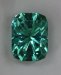 Light included medium blue green Barion cut cushion.  #686
