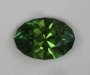 Very nice medium toned grasss green oval.  #688