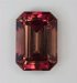 Rich pink ends and more orangish sided emerald cut.  #711
