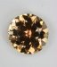 Care for a spot of tea colored tourmaline, round.  #717