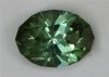 Dichroic, rather watery mixture of bluish green and yellowish green color.  #728