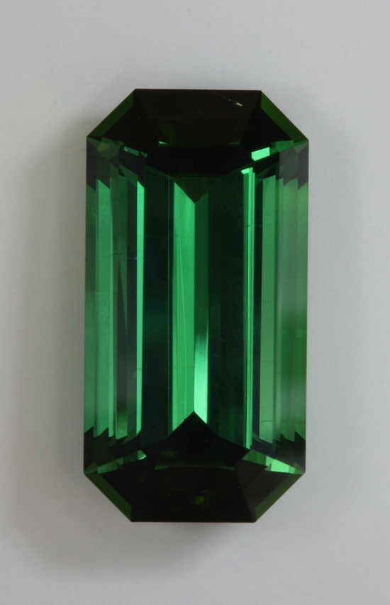 Larg, long ratio, clean classic tourmaline green emerald cut.  #761