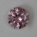 Bright lightly included baby pink round from Afghanistan.  #764