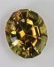 Large oval with a super nova pavilion and a stepped crown that is a yellow washed with green.  #801