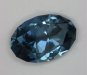 A fine medium pastel blue color without a hint of green, but with a touch of gray, oval.  #809