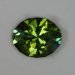 A dichroic blue/green to yellow/green oval that is mixed well.  #813