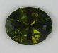 Mildly dichroic, slight included olive green oval.  #829