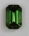 Semi-closed ends and a bright yellower green color, emerald cut.  #832