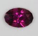 Darker rich red with a wash of purple, oval.  #836