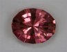 Bright hot pink oval with stepped crown.  #868