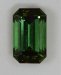 Slightly included, open ended, grass green emerald cut.  #874