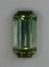 Pale, longer ratio, emerald cut that slides from clear to celery green.  #887